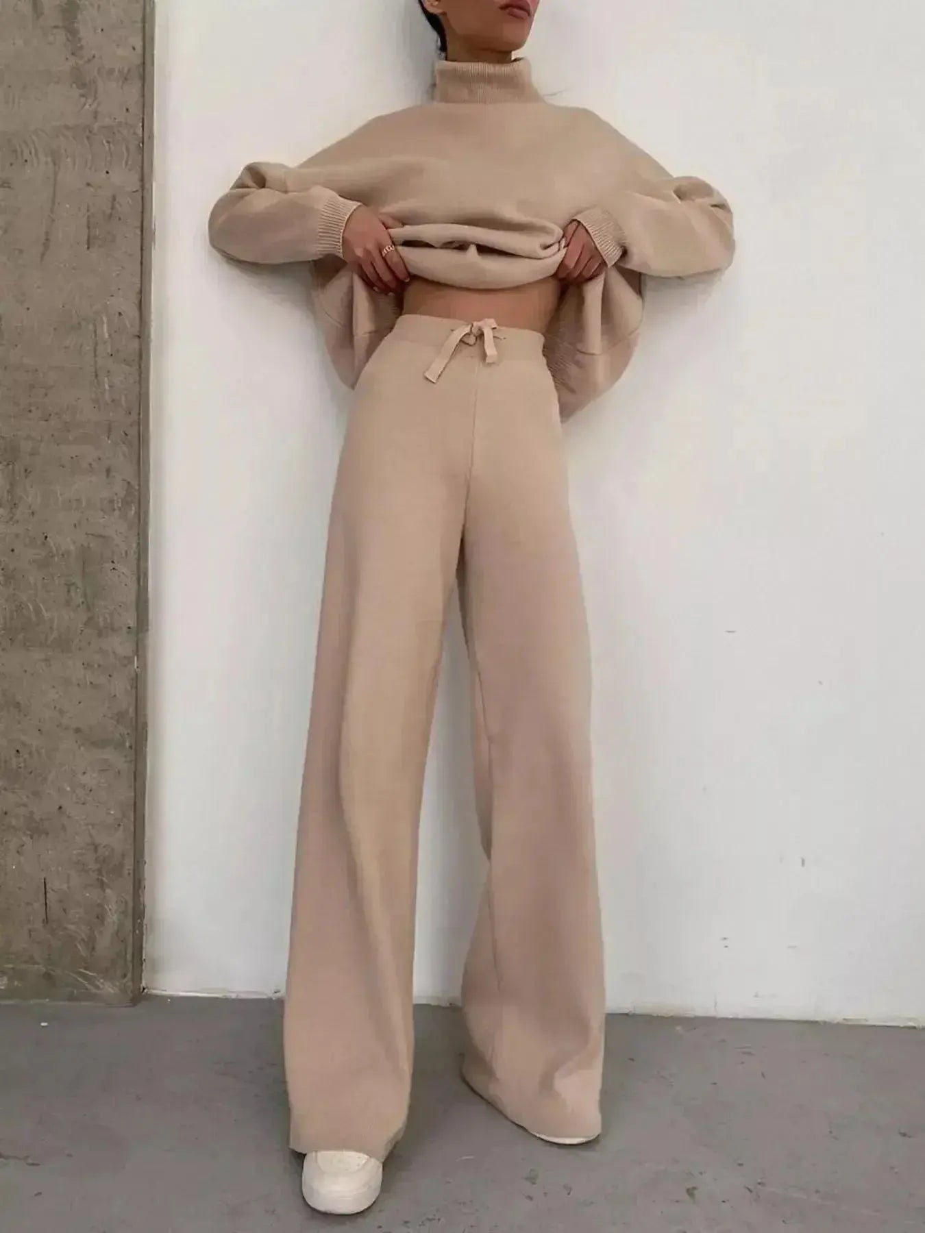 Plus size turtleneck long sleeve sweater and matching pants lounge set by Trendsi, cozy two-piece outfit for relaxed wear.