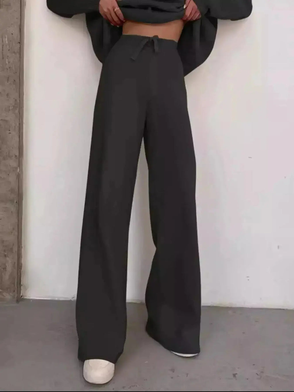 Plus size turtleneck long sleeve sweater and pants two-piece lounge set by Trendsi, cozy and stylish for relaxed wear.