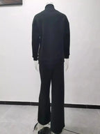 Plus size turtleneck long sleeve sweater and matching pants two-piece lounge set by Trendsi, cozy and stylish for casual wear.
