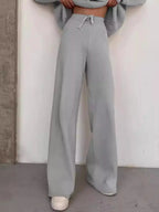 Plus size turtleneck long sleeve sweater and matching pants lounge set by Trendsi, comfortable casual two-piece outfit.
