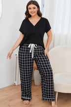 Plus size V-neck top and plaid lounge pants 2-piece set from Plush Fashion Hub, comfortable casual wear for relaxed days.