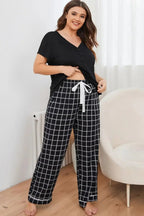 Plus size V-neck top and plaid lounge pants 2-piece set by Plush Fashion Hub, comfortable sleepwear or loungewear ensemble.