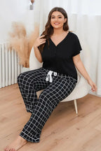 Plus size V-neck top and plaid lounge pants 2-piece set from Plush Fashion Hub, comfortable casual wear for relaxed days.