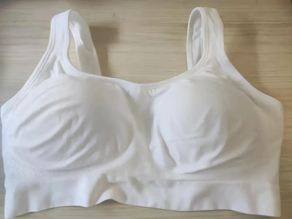 Plus-size seamless shaper bra by Plush Fashion Hub, supportive contouring lingerie for women in S to 3XL, bright underpants style.