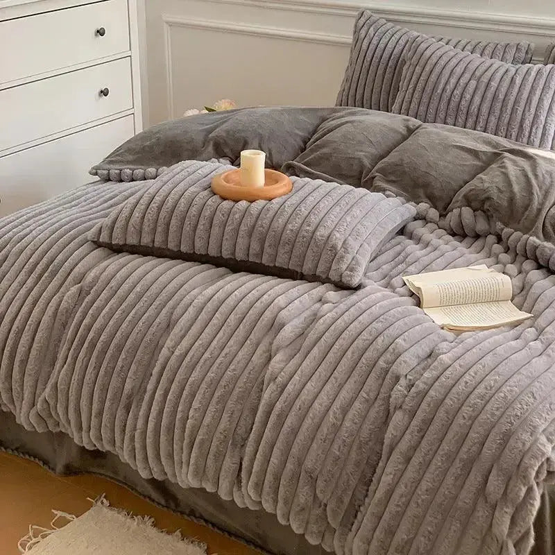 Soft rabbit flannel four-piece bed sheet set by Plush Fashion Hub with ultra-soft, warm winter bedding for cozy comfort.