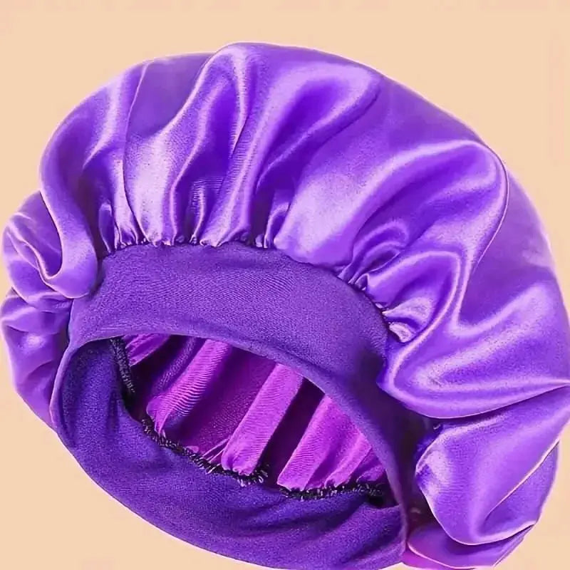 Plush Fashion Hub satin sleep bonnet with wide comfort band, designed for hair protection and gentle overnight wear.