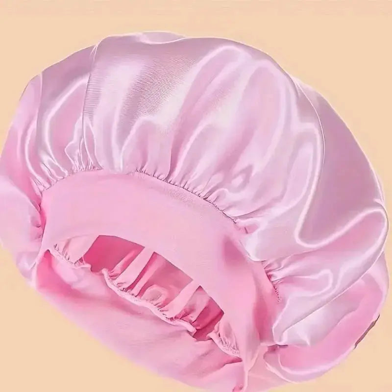 Plush Fashion Hub premium satin sleep bonnet with wide comfort band, designed for hair protection during sleep.