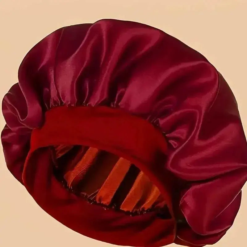 Plush Fashion Hub satin sleep bonnet with wide comfort band, designed for hair protection during sleep.