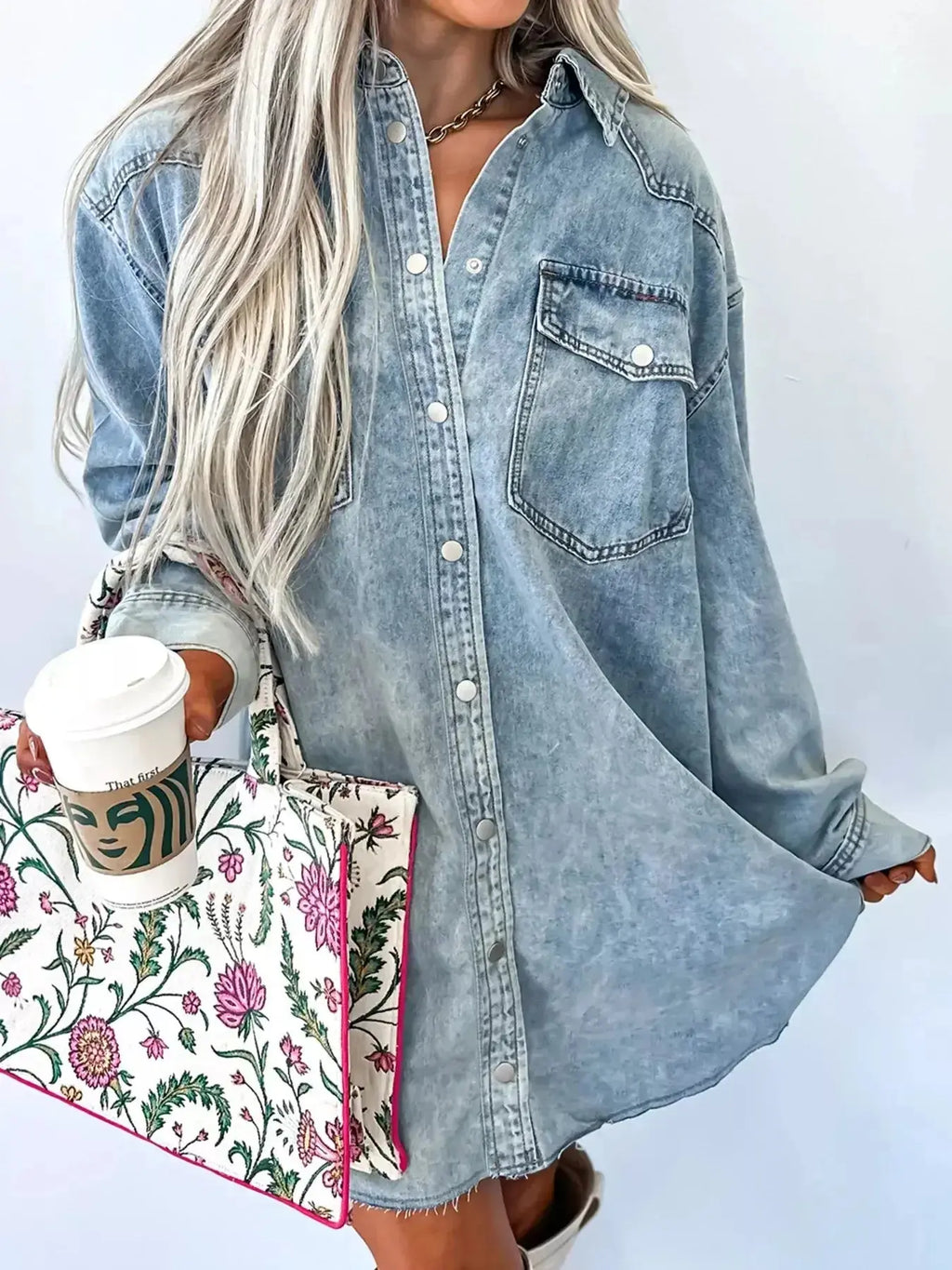Raw hem denim button-down shirt dress with pockets, relaxed cotton fit, worn casually by a model, by Trendsi.