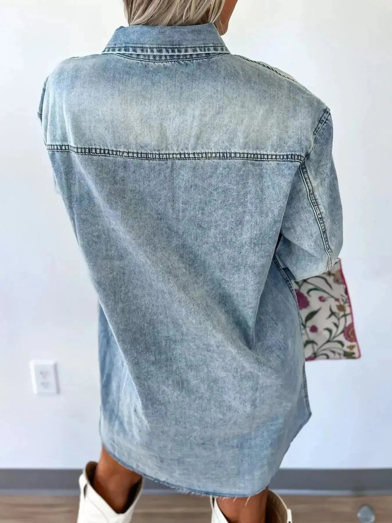 Raw hem denim button-down shirt dress with pockets, relaxed fit, made from cotton, by Trendsi. Blue denim, casual style.