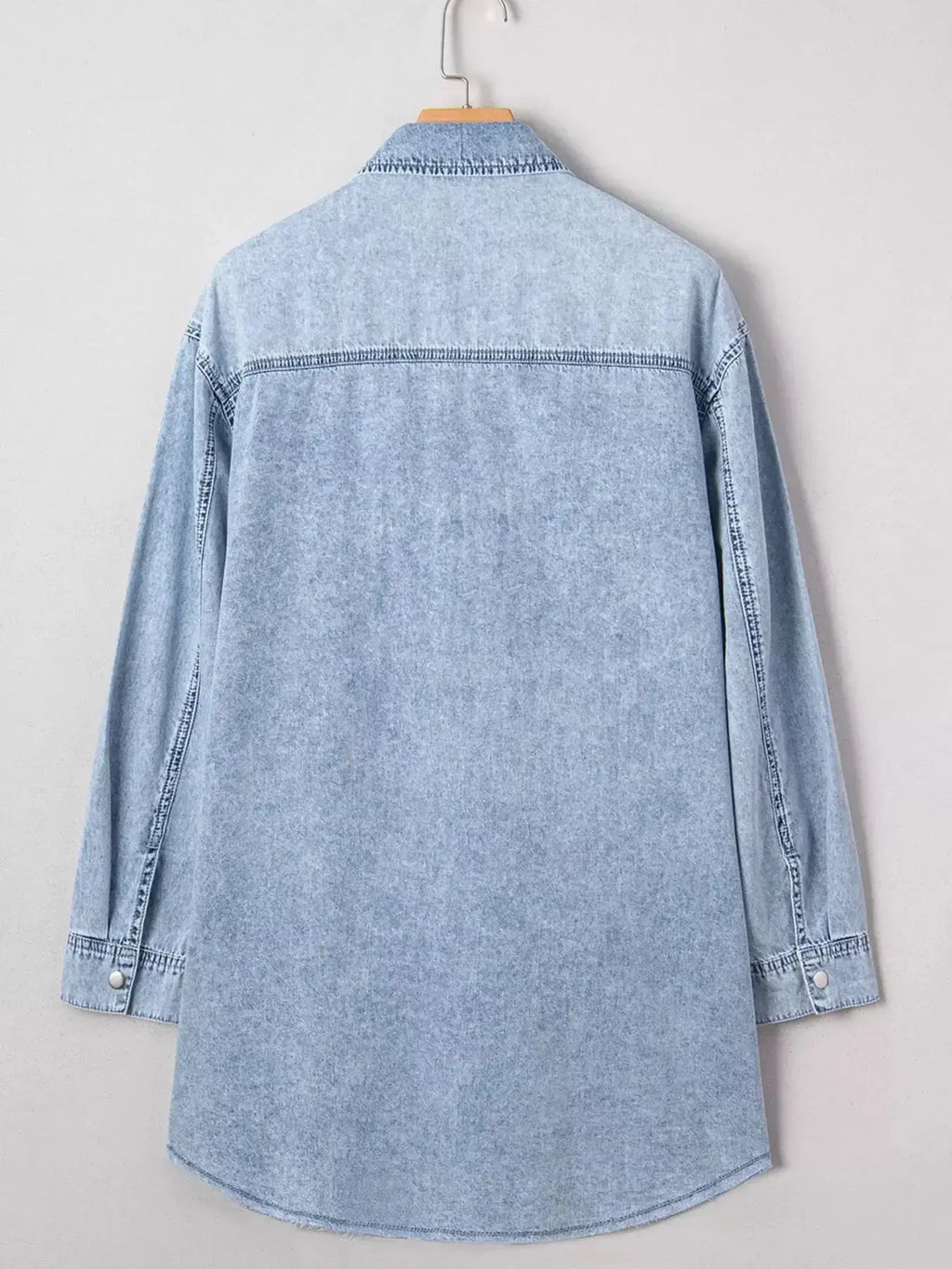 Raw hem denim button-down shirt dress with pockets, relaxed cotton fit, casual style, by Trendsi.