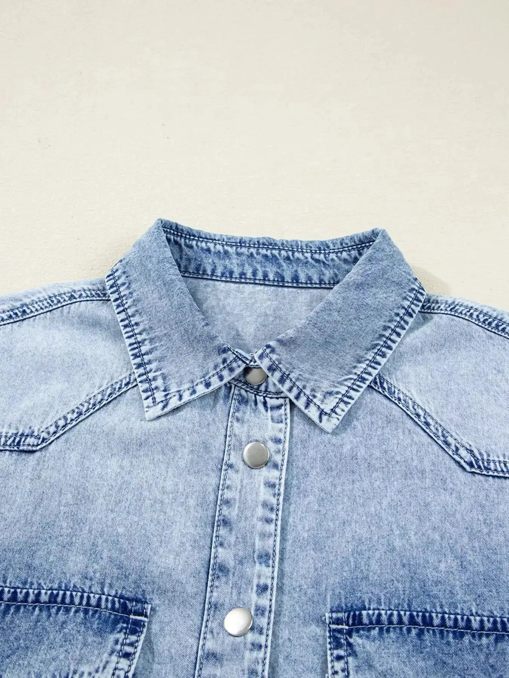 Raw hem denim button-down shirt dress with pockets, relaxed cotton fit, casual style, from Trendsi.