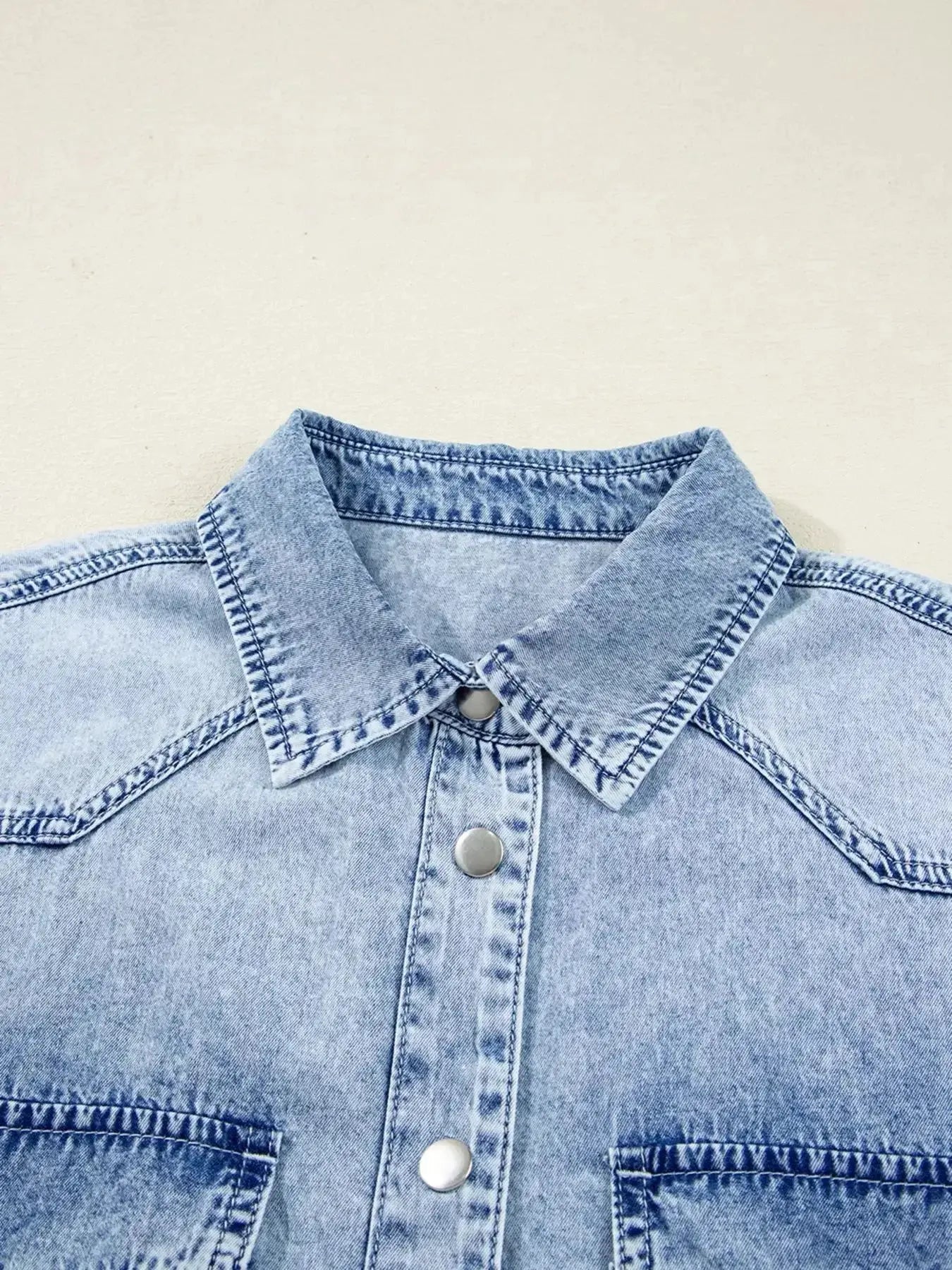 Raw hem denim button-down shirt dress with pockets, relaxed cotton fit, casual style, from Trendsi.