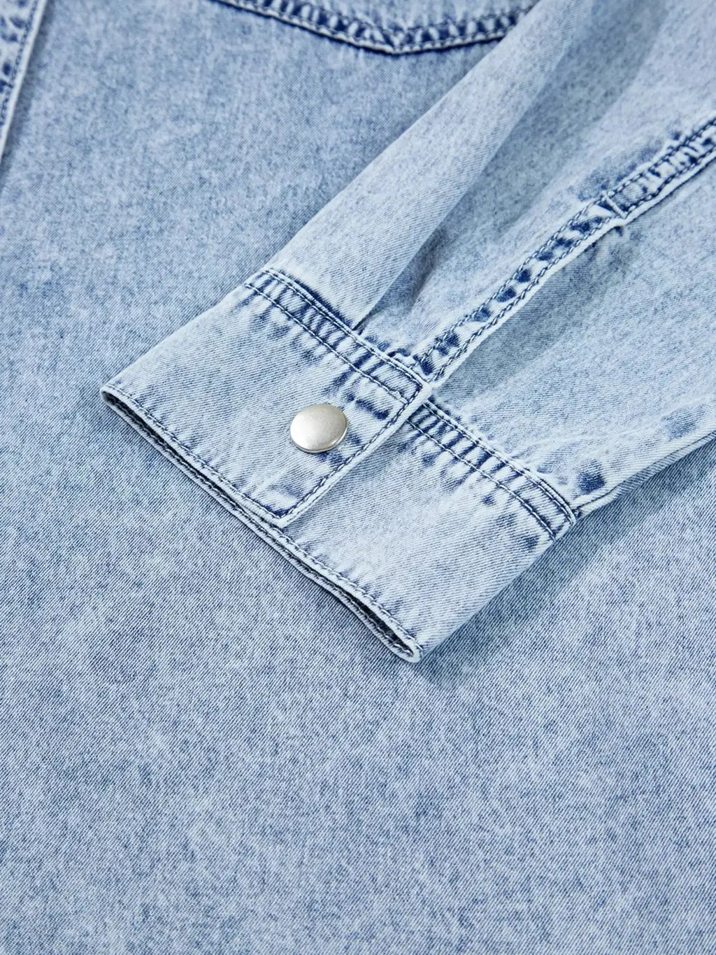 Raw hem denim button-down shirt dress with pockets, relaxed cotton fit, shown in classic blue denim fabric by Trendsi.