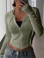 Women's ribbed knit cropped zip-up jacket with hood, plush fabric outerwear, stylish and cozy from Plush Fashion Hub.