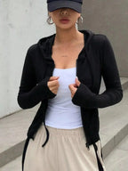 Women's ribbed knit cropped zip-up jacket with hood, outerwear by Plush Fashion Hub, shown in a stylish, fitted design.