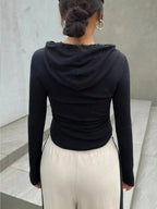 Women's ribbed knit cropped zip-up jacket with hood, stylish outerwear by Plush Fashion Hub, shown on a model.