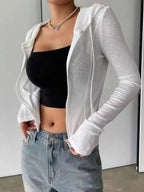 Women's ribbed knit cropped zip-up hoodie jacket by Plush Fashion Hub, featuring a front zipper and hood, perfect for casual outerwear.
