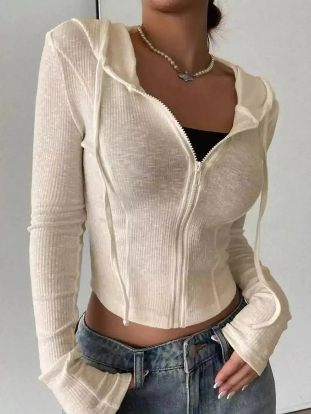Women's ribbed knit cropped zip-up jacket with hood from Plush Fashion Hub, featuring a fitted design and cozy outerwear style.