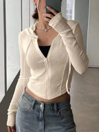 Women's ribbed knit cropped zip-up hoodie with hood, stylish outerwear from Plush Fashion Hub, perfect for casual wear.