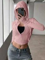 Women's ribbed knit cropped zip-up jacket with hood from Plush Fashion Hub, featuring a fitted design and front zipper closure.