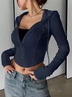 Women's ribbed knit cropped zip-up jacket with hood from Plush Fashion Hub, showing the textured knit fabric and front zipper detail.