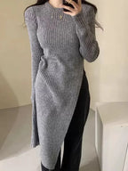 Round neck irregular slit knit dress from Plush Fashion Hub, showcasing a stylish, casual knit dress with unique slit details.
