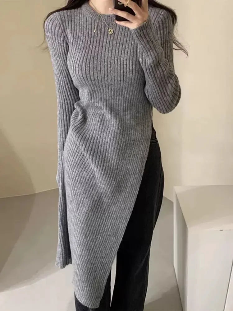 Round neck irregular slit knit dress from Plush Fashion Hub, showcasing a stylish, casual knit dress with unique slit details.