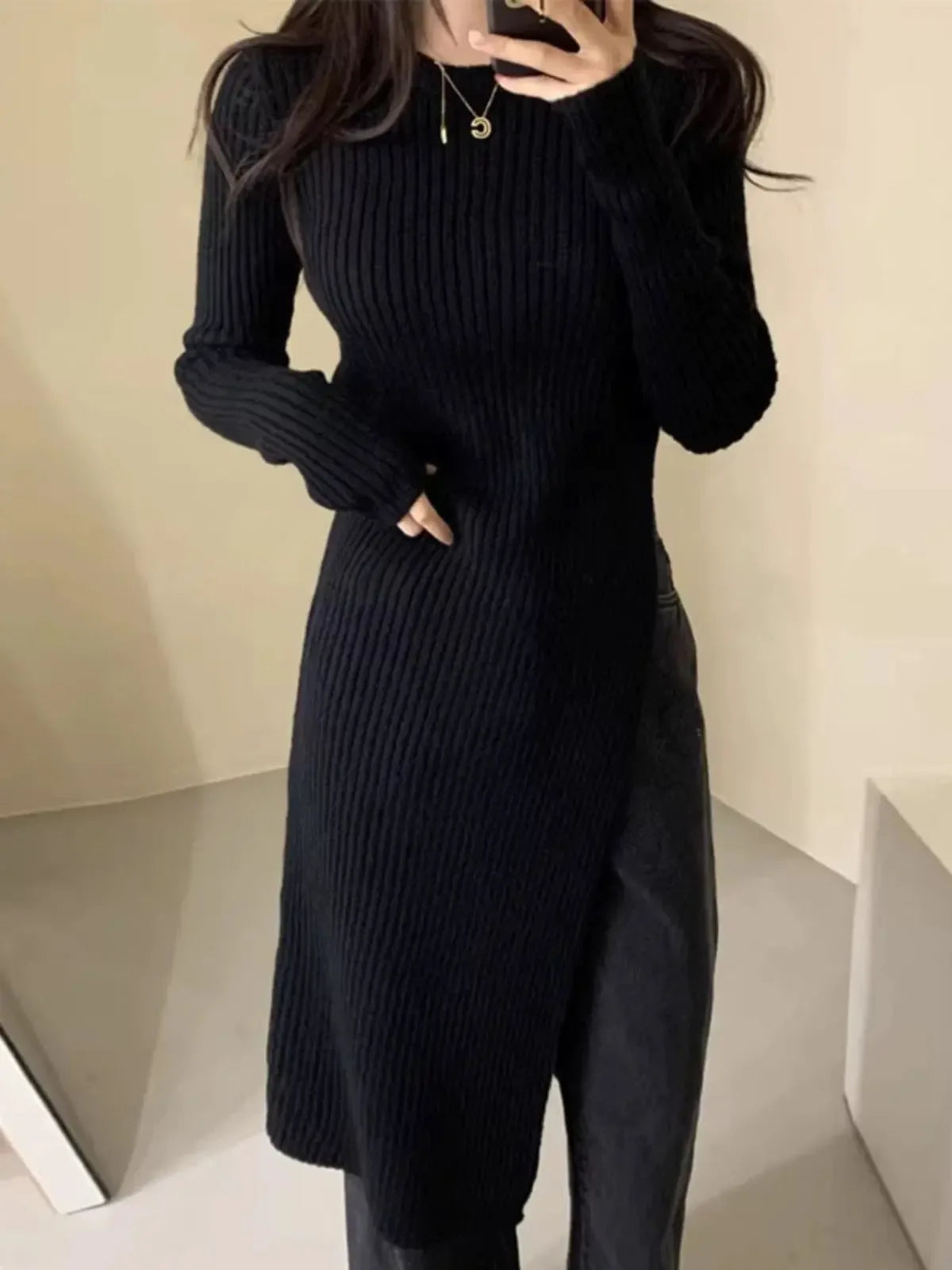 Round neck irregular slit knit dress by Plush Fashion Hub, featuring a stylish design and comfortable fit, perfect for casual wear.