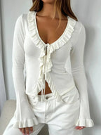 Ruffled tie-front flare sleeve blouse by Plush Fashion Hub, lightweight and elegant shirt with feminine details and stylish design.