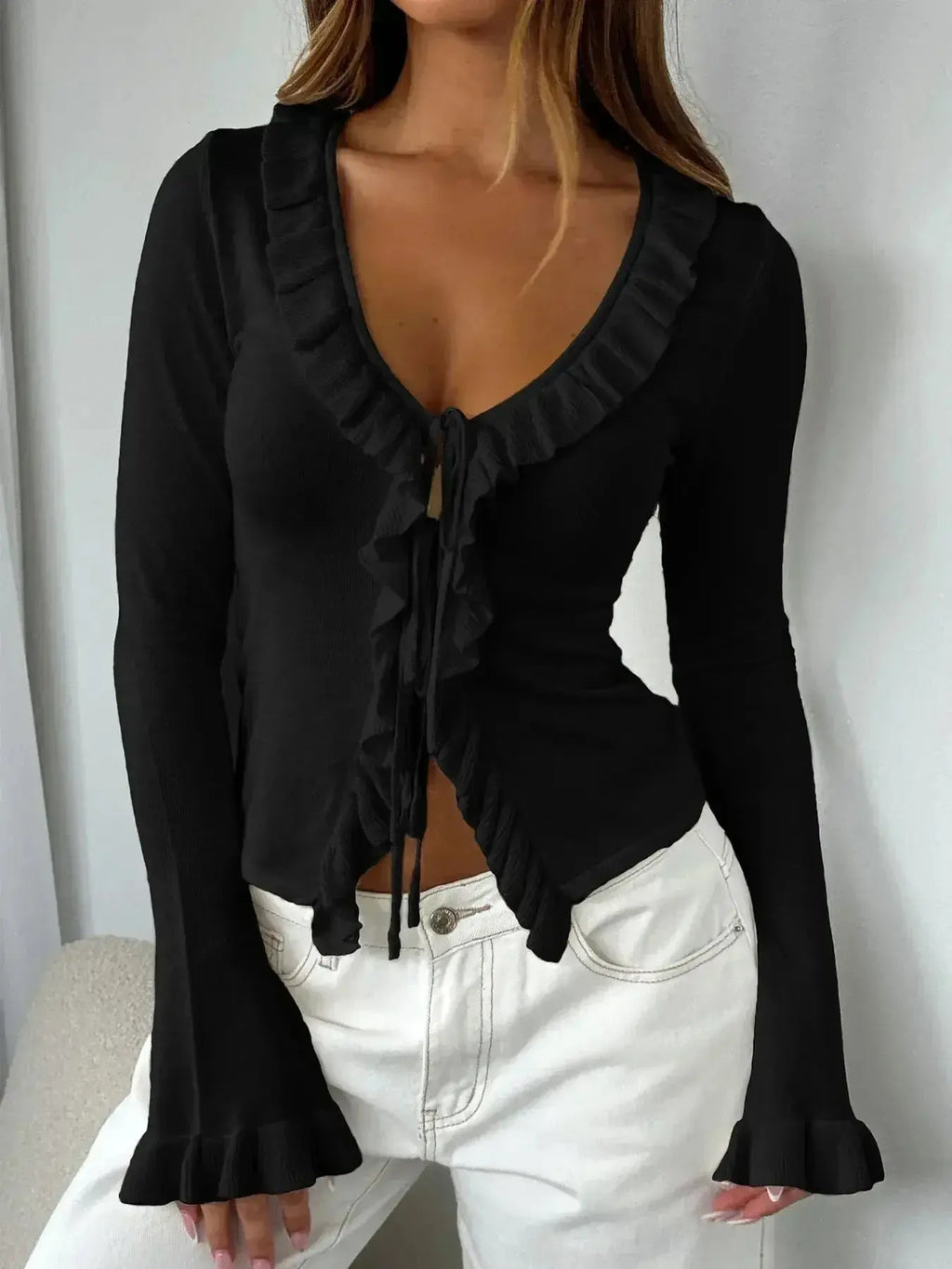 Elegant lightweight ruffled tie-front flare sleeve blouse by Plush Fashion Hub, shown as a stylish women's shirt.