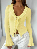 Elegant ruffled tie-front flare sleeve blouse by Plush Fashion Hub, lightweight fashionable shirt with stylish ruffle details.