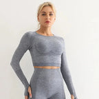 Seamless yoga crop top for women in activewear, featuring a fitted design and soft fabric, by Plush Fashion Hub.