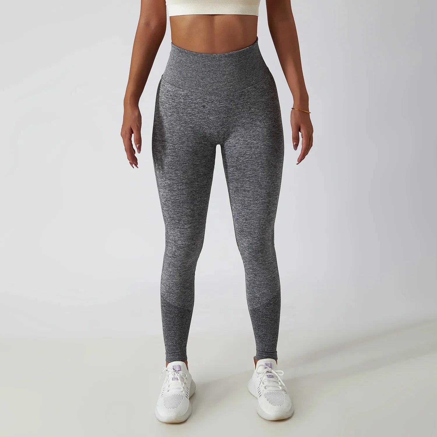 Seamless ribbed yoga leggings from FitiqueFit with tummy control, designed for activewear and comfortable movement.