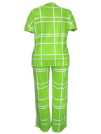 Plus size women's casual two-piece set with striped grid print and round neck from Plush Fashion Hub, featuring a comfortable fit.