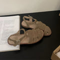 Women's Roman sandals by LadyShow.Store, flat summer leather cage shoes with hollowed design and retro style.