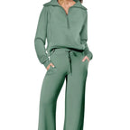 Women two-piece set with sweatshirt and wide-leg pants by Plush Fashion Hub, shown in a comfortable, stylish casual outfit.