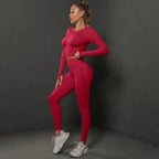 Women's seamless long sleeve yoga top by FitiqueFit, showing a fitted activewear top with breathable fabric and sleek design.