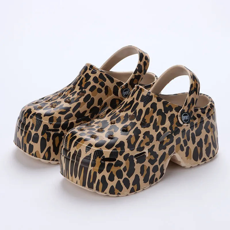 Leopard print thick bottom platform slippers for women by Plush Fashion Hub, featuring a stylish and comfortable slip-on design.