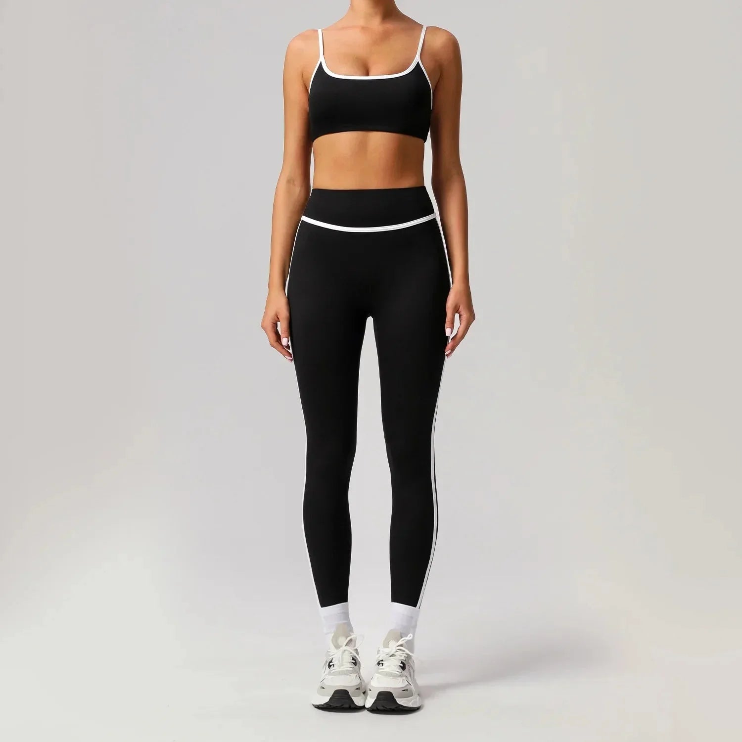 Black seamless yoga set by Plush Fashion Hub featuring high waist and hip-lifting design, ideal for activewear workouts.