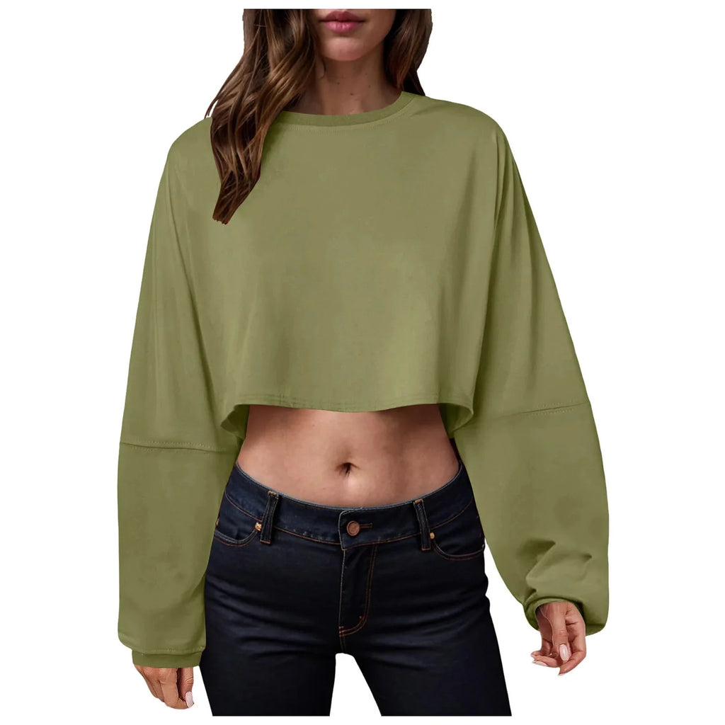 Women’s long sleeve loose-fit crop top in casualwear style by Plush Fashion Hub, shown in soft fabric with relaxed fit.