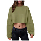 Women’s long sleeve loose-fit crop top in casualwear style by Plush Fashion Hub, shown in soft fabric with relaxed fit.