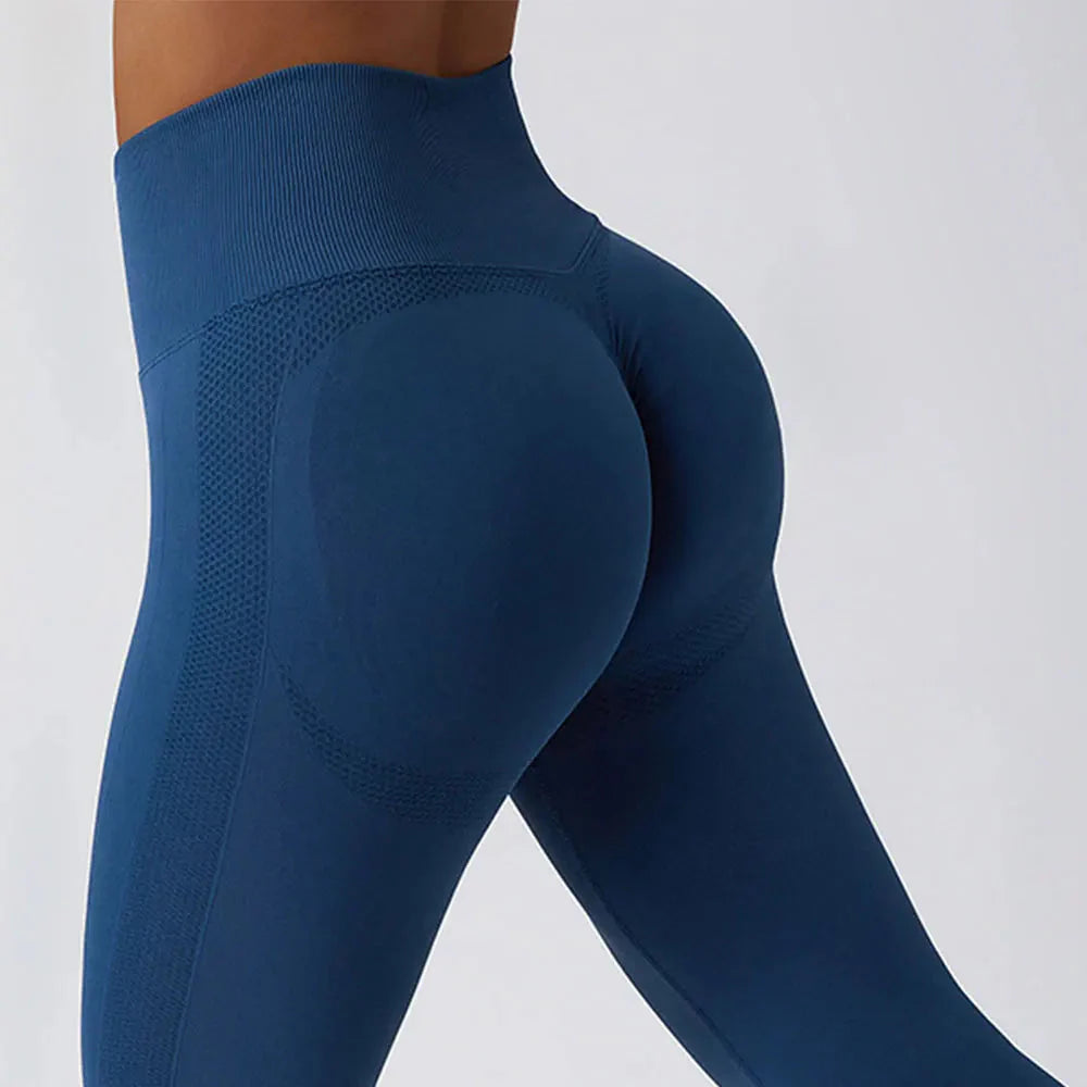 Seamless ribbed yoga leggings by FitiqueFit featuring tummy control fit, designed for activewear and comfortable movement.