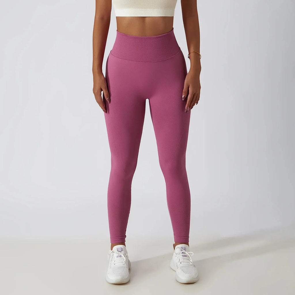Seamless ribbed FitiqueFit yoga leggings with tummy control, high-waist activewear for comfortable stretching and movement.