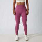 Seamless ribbed FitiqueFit yoga leggings with tummy control, high-waist activewear for comfortable stretching and movement.