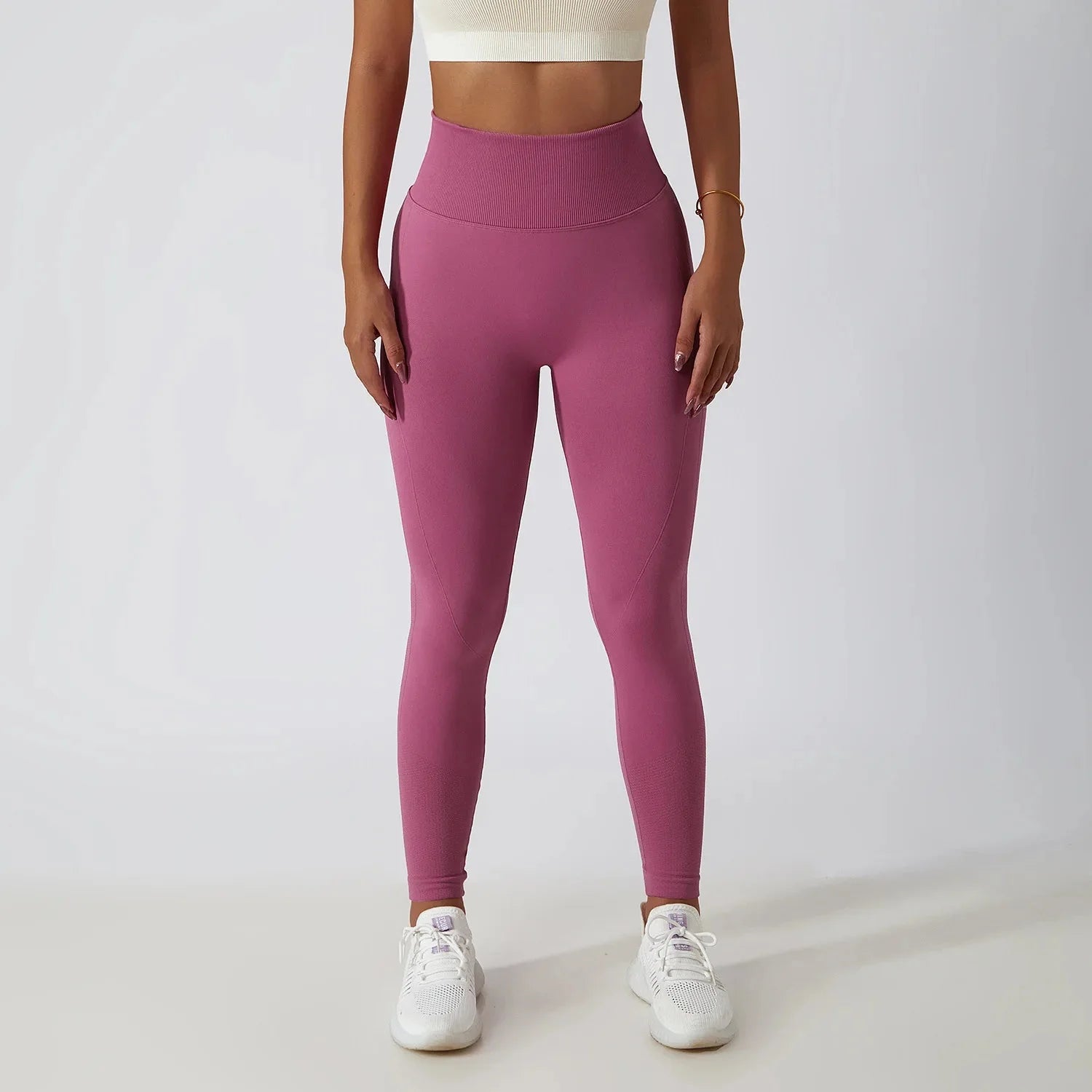 Seamless ribbed FitiqueFit yoga leggings with tummy control, high-waist activewear for comfortable stretching and movement.