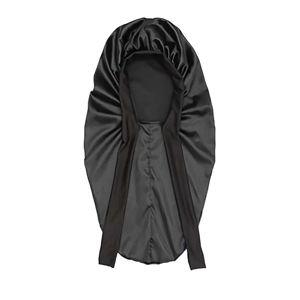 Women’s satin sleeping bonnet with long tail braid design, soft head cover for sleep, shower, sauna, and bath by Plush Fashion Hub.