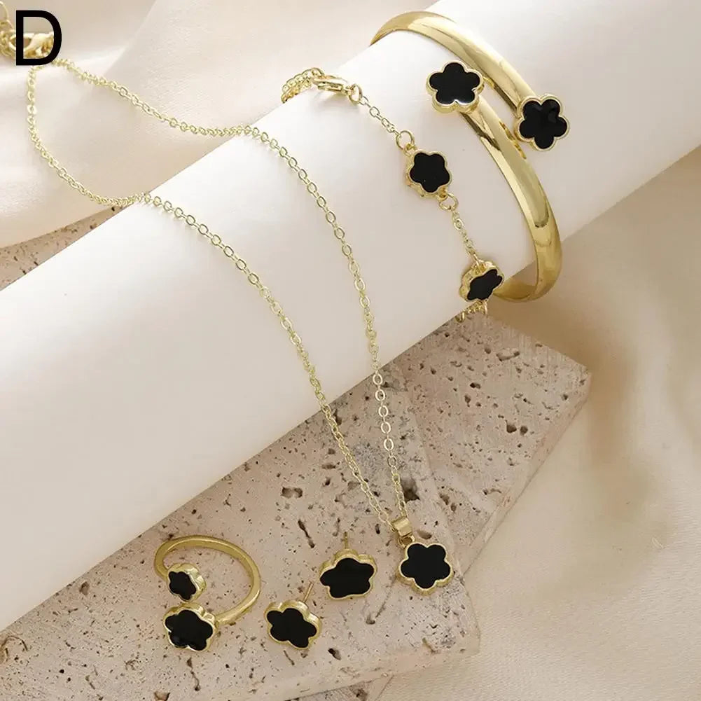 Plum Blossom Plant five-leaf necklace and earring set by Plush Fashion Hub featuring floral jewelry with delicate plum blossom design.