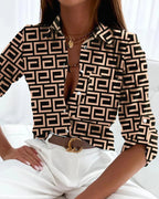Women’s stripe print long-sleeve blouse by Plush Fashion Hub, casualwear top with vertical stripe pattern and relaxed fit.