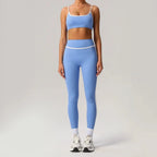 Black seamless yoga set by Plush Fashion Hub featuring high waist and hip-lifting design, shown on a model in activewear pose.